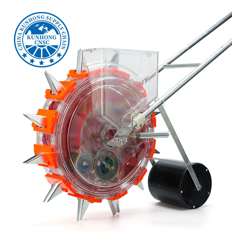 يد زارع الخضروات البلاستيكية دفع بذرة الذرة