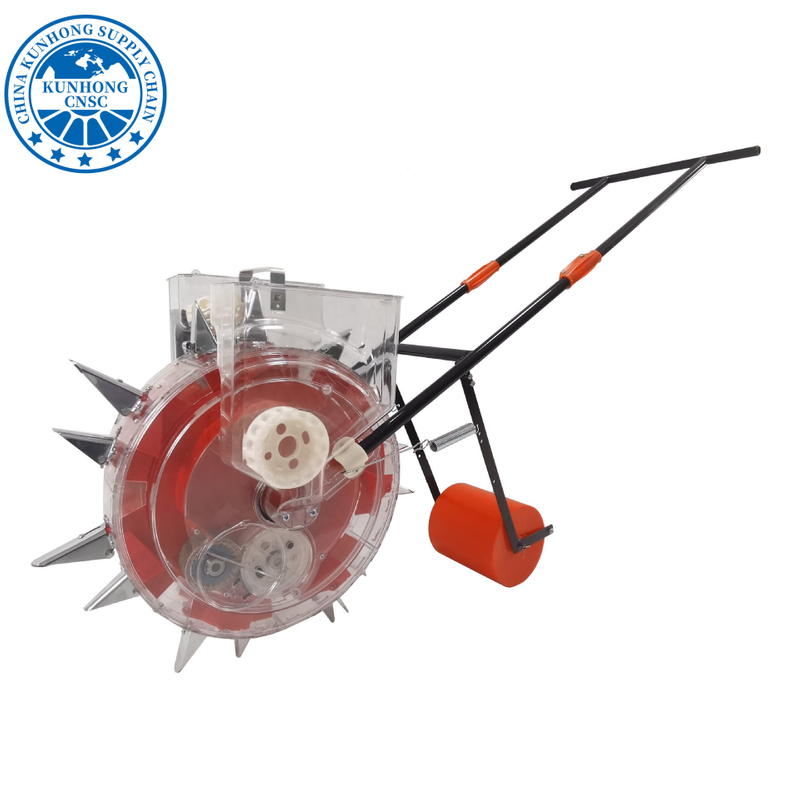 يد صغيرة دفع البذور بذرة الذرة