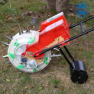 يد دفع اليدين زارع البذور الفول السوداني